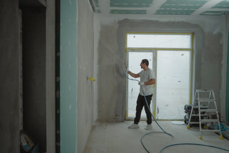 Man working on home addition construction project